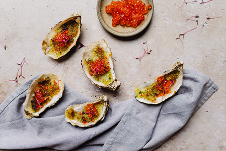 Oesters met kruidengratin en zalmkaviaar